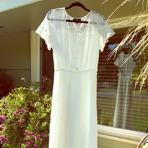 Full length white dress w/ lace top, sleeves.